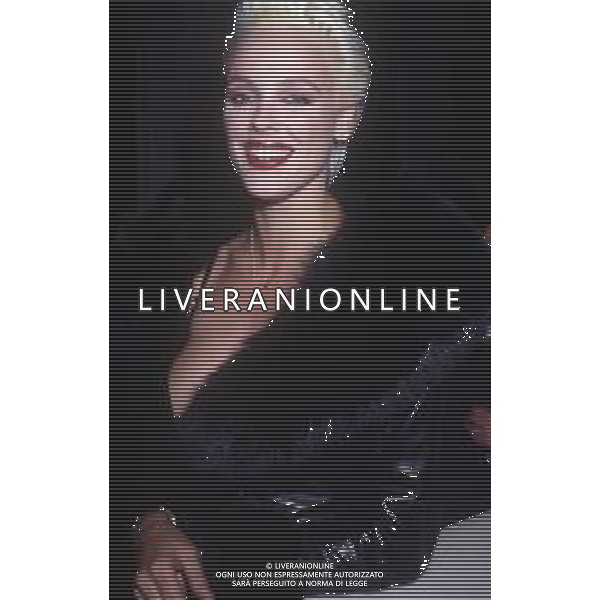 DIAP-RETROSPETTIVA BRIGITTE NIELSEN ATTRICE NELLA FOTO BRIGITTE NIELSEN NELL\'ANNO 1989 A MILANO TRASMISSIONE TELEVISIVA “ODIENS“ AG ALDO LIVERANI SAS 