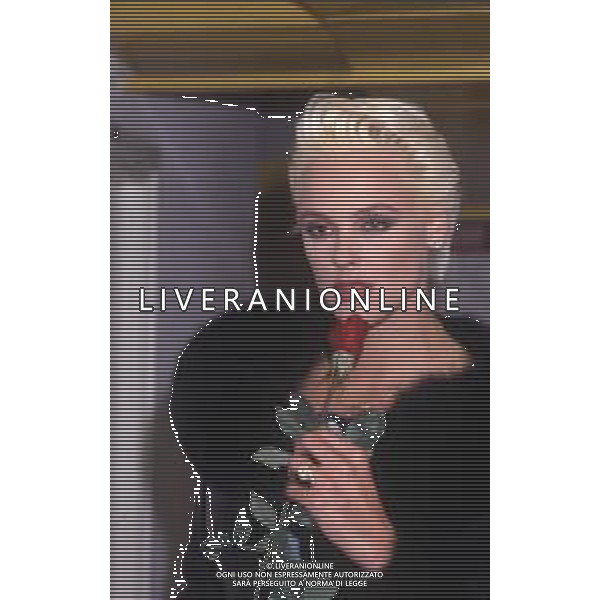 DIAP-RETROSPETTIVA BRIGITTE NIELSEN ATTRICE NELLA FOTO BRIGITTE NIELSEN NELL\'ANNO 1989 A MILANO TRASMISSIONE TELEVISIVA “ODIENS“ AG ALDO LIVERANI SAS 