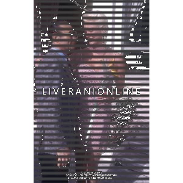 DIAP-RETROSPETTIVA BRIGITTE NIELSEN ATTRICE NELLA FOTO BRIGITTE NIELSEN CON TONY RENIS NELL\'ANNO 1992 A SANREMO AG ALDO LIVERANI SAS  