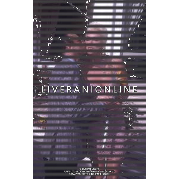 DIAP-RETROSPETTIVA BRIGITTE NIELSEN ATTRICE NELLA FOTO BRIGITTE NIELSEN CON TONY RENIS NELL\'ANNO 1992 A SANREMO AG ALDO LIVERANI SAS