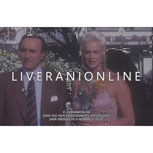 DIAP-RETROSPETTIVA BRIGITTE NIELSEN ATTRICE NELLA FOTO BRIGITTE NIELSEN CON PIPPO BAUDO NELL\'ANNO 1992 A SANREMO AG ALDO LIVERANI SAS 