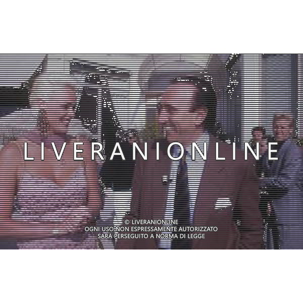DIAP-RETROSPETTIVA BRIGITTE NIELSEN ATTRICE NELLA FOTO BRIGITTE NIELSEN CON PIPPO BAUDO NELL\'ANNO 1992 A SANREMO AG ALDO LIVERANI SAS  