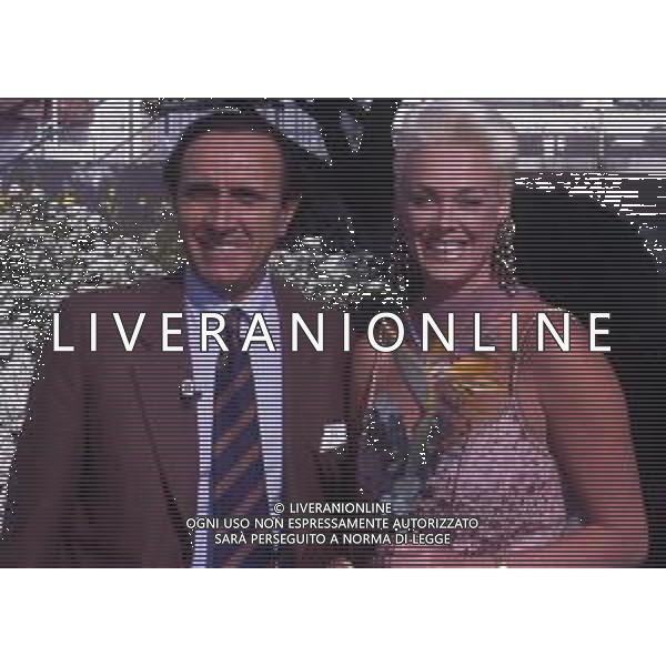 DIAP-RETROSPETTIVA BRIGITTE NIELSEN ATTRICE NELLA FOTO BRIGITTE NIELSEN CON PIPPO BAUDO NELL\'ANNO 1992 A SANREMO AG ALDO LIVERANI SAS 
