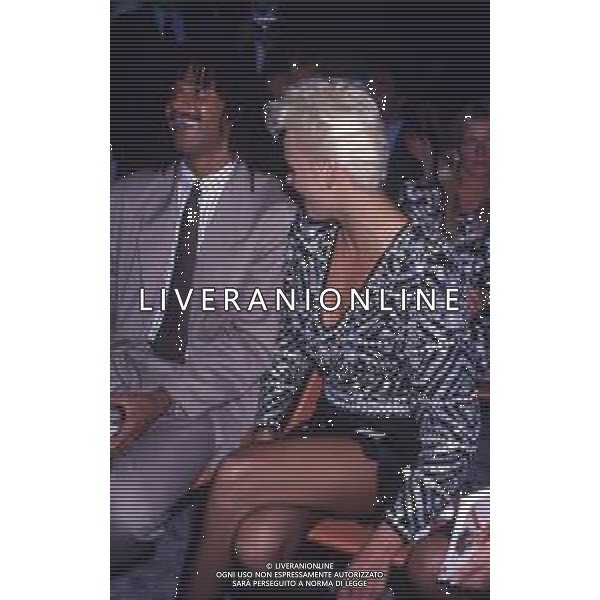 DIAP-RETROSPETTIVA BRIGITTE NIELSEN ATTRICE NELLA FOTO BRIGITTE NIELSEN CON RUUD GULLITT A MILANO A UNA SFILATA DI MODA AG ALDO LIVERANI SAS 