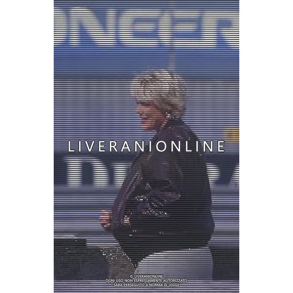DIAP-RETROSPETTIVA BRIGITTE NIELSEN ATTRICE NELLA FOTO BRIGITTE NIELSEN ALL\'AUTODROMO DI MONZA PER LA GARA AUTOMOBILISTICA DEL MARITO RAOUL MEYER AG ALDO LIVERANI SAS 