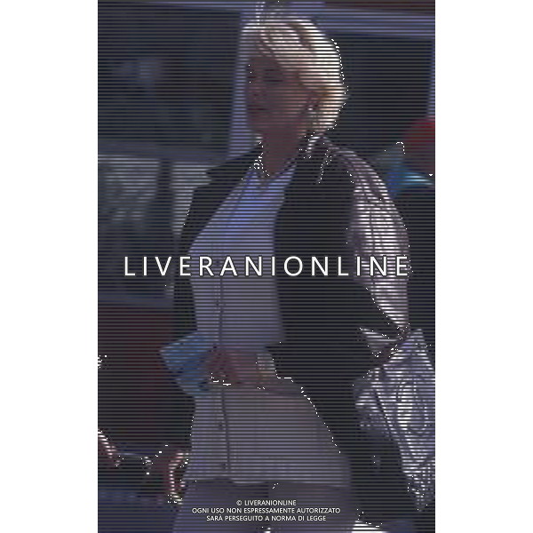 DIAP-RETROSPETTIVA BRIGITTE NIELSEN ATTRICE NELLA FOTO BRIGITTE NIELSEN ALL\'AUTODROMO DI MONZA PER LA GARA AUTOMOBILISTICA DEL MARITO RAOUL MEYER AG ALDO LIVERANI SAS 