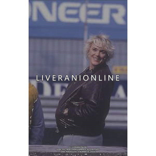 DIAP-RETROSPETTIVA BRIGITTE NIELSEN ATTRICE NELLA FOTO BRIGITTE NIELSEN ALL\'AUTODROMO DI MONZA PER LA GARA AUTOMOBILISTICA DEL MARITO RAOUL MEYER AG ALDO LIVERANI SAS 