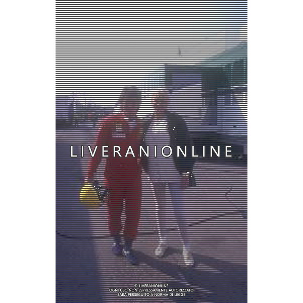 DIAP-RETROSPETTIVA BRIGITTE NIELSEN ATTRICE NELLA FOTO BRIGITTE NIELSEN ALL\'AUTODROMO DI MONZA PER LA GARA AUTOMOBILISTICA DEL MARITO RAOUL MEYER AG ALDO LIVERANI SAS 