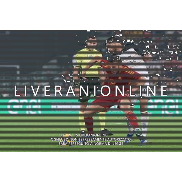 Bryan Cristante of AS Roma and Hamza Rafia of US Lecce during the Italian soccer Serie A match AS Roma vs US Lecce on November 5, 2023 at Olympic Stadium in Rome, Italy. Photo by Emmanuele Mastrodonato/ag. Aldo Liverani sas