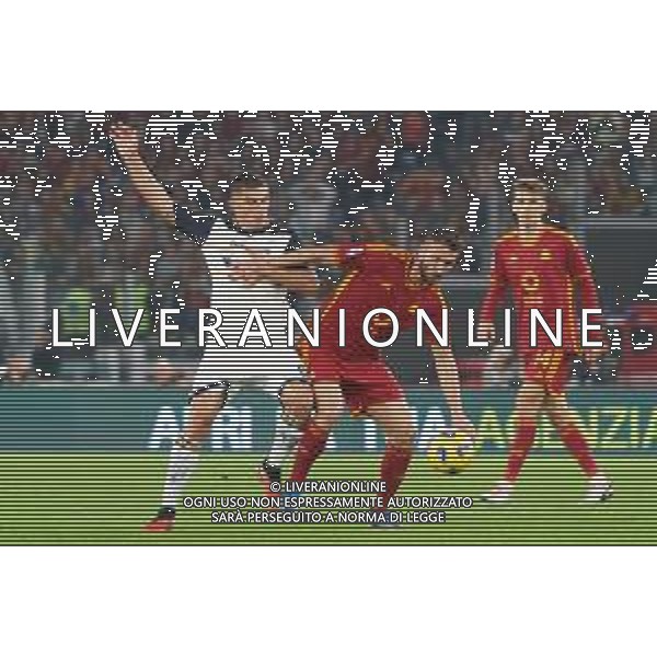 Bryan Cristante of AS Roma and Nikola Krstovic of US Lecce during the Italian soccer Serie A match AS Roma vs US Lecce on November 5, 2023 at Olympic Stadium in Rome, Italy. Photo by Emmanuele Mastrodonato/ag. Aldo Liverani sas