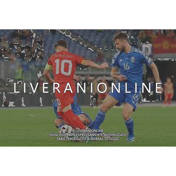 Bryan Cristante of Italy and Enis Bardhi of North Macedonia during the UEFA EURO 2024 European qualifier match between Italy and North Macedonia at Stadio Olimpico on November 17, 2023 in Rome, Italy. Photo by Emmanuele Mastrodonato/ag. Aldo Liverani sas