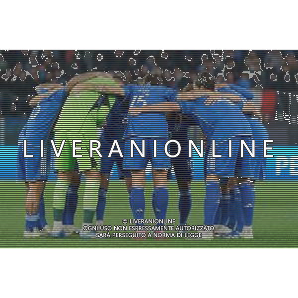 Italy players hug each other in a circle during the UEFA EURO 2024 European qualifier match between Italy and North Macedonia at Stadio Olimpico on November 17, 2023 in Rome, Italy. Photo by Emmanuele Mastrodonato/ag. Aldo Liverani sas