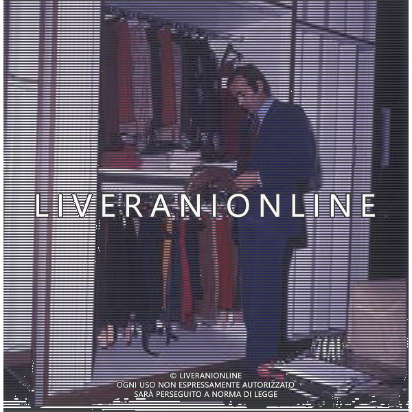 COL-RETROSPETTIVA MARIO CORSO CALCIATORE NELLA FOTO MARIO CORSO A MILANO NEL SUO NEGOZIO DI ABBIGLIAMENTO AG ALDO LIVERANI SAS