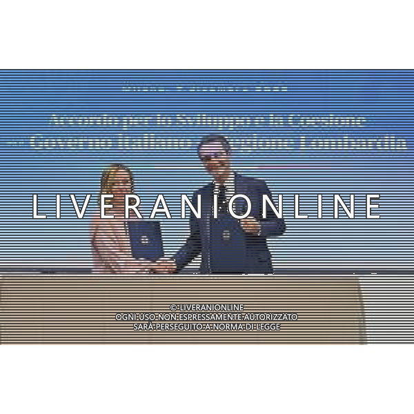 TVRG Accordo Governo Regione nella foto Giorgia Meloni e Attilio Fontana Rho (MI) 07-12-2023 Cerimonia di sottoscrizione dell\'accordo per lo Sviluppo e la Coesione tra il Governo Italiano e la Regione Lombardia da parte del Presidente del Consiglio dei Ministri Giorgia Meloni e del Presidente della Regione Lombardia Attilio Fontana foto Roberto Garavaglia/ag. Aldo Liverani sas