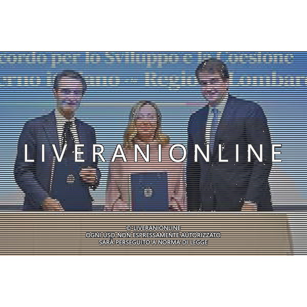 TVRG Accordo Governo Regione nella foto da SX Attilio Fontana, Giorgia Meloni e Raffaele Fitto Rho (MI) 07-12-2023 Cerimonia di sottoscrizione dell\'accordo per lo Sviluppo e la Coesione tra il Governo Italiano e la Regione Lombardia da parte del Presidente del Consiglio dei Ministri Giorgia Meloni e del Presidente della Regione Lombardia Attilio Fontana foto Roberto Garavaglia/ag. Aldo Liverani sas