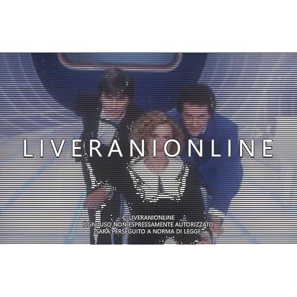 DIAP-RETROSPETTIVA LORETTA GOGGI-CANTANTE-ATTRICE-IMITATRICE-CONDUTTRICE TELEVISIVA E SCRITTRICE NELLA FOTO MEMO REMIGI CON LORETTA GOGGI E GIANNI BREZZA NEL PROGRAMMA TV \'GOGGI QUIZ\' A MILANO NEL 1983 A MILANO AG ALDO LIVERANI SAS