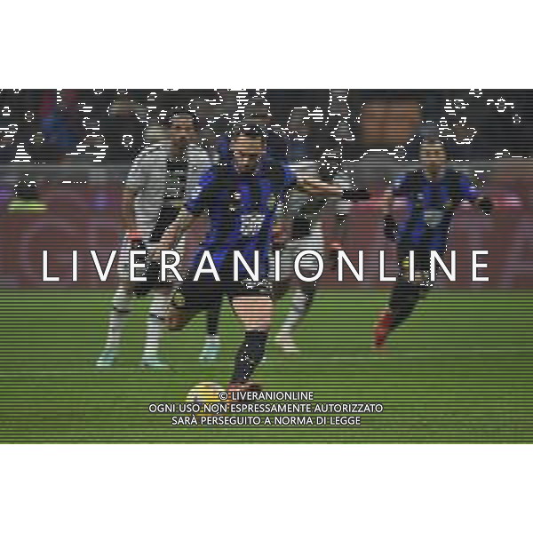 Inter vs Udinese nella foto Hakan Calhanoglu (Inter) segna il gol dell\'1 a 0 Milano 09-12-2023 Stadio Giuseppe Meazza - San Siro Campionato Serie A TIM - 15a giornata foto Roberto Garavaglia/ag. Aldo Liverani sas/ AGENZIA ALDO LIVERANI SAS