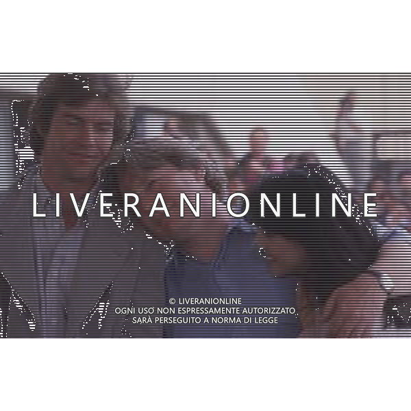DIAP-RETROSPETTIVA DENNIS QUAID ATTORE NELLA FOTO DENNIS QUAID CON TOMLYN TOMITA E ALAN PARKER A CANNES NELL\'ANNO 1990 AG ALDO LIVERANI SAS 