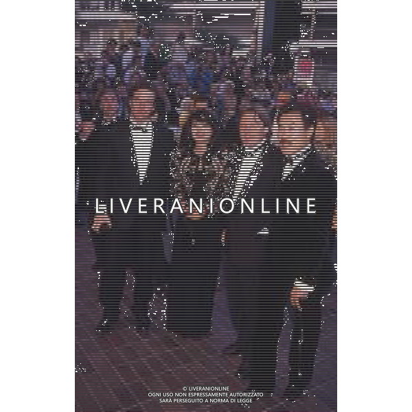 DIAP-RETROSPETTIVA DENNIS QUAID ATTORE NELLA FOTO DENNIS QUAID CON TOMLYN TOMITA E ALAN PARKER A CANNES NELL\'ANNO 1990 AG ALDO LIVERANI SAS