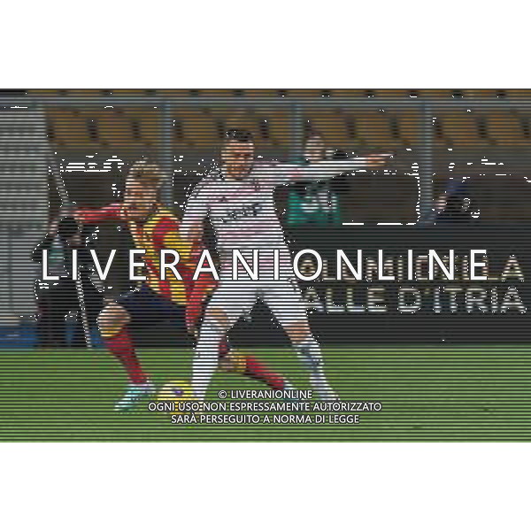 Filip Kostic of Juventus and Pontus Almqvist of US Lecce during the Italian soccer Serie A match US Lecce vs Juventus on January 21, 2024 at Via del Mare Stadium in Lecce, Italy. Photo by Emmanuele Mastrodonato/ag. Aldo Liverani sas