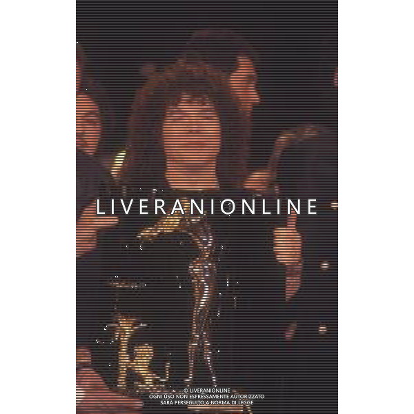 DIAP-RETROSPETTIVA RICCARDO COCCIANTE CANTANTE NELLA FOTO RICCARDO COCCIANTE NELL\'ANNO 1991 AL FESTIVAL DI SANREMO AG ALDO LIVERANI SAS 