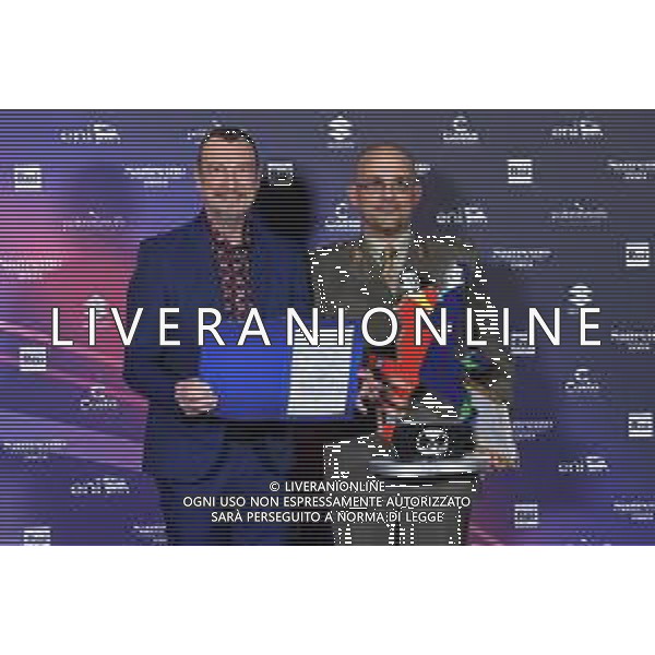 Festival Sanremo 2024 nella foto Amadeus con il maggiore Filippo Cangiamila maestro direttore della banda dell\'Esercito Italiano, che ha consegnato ad Amadeus il suo foglio matricolare 74mo Festival della Canzone Italiana, photocall del 10 febbraio Teatro Ariston - Sanremo (IM) 10-02-2024 foto Roberto Garavaglia/agenzia Aldo Liverani sas/AGENZIA ALDO LIVERANI SAS