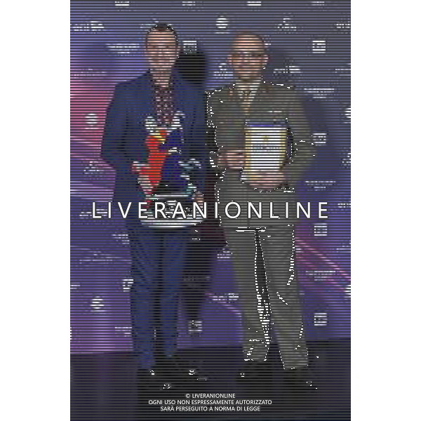 Festival Sanremo 2024 nella foto Amadeus con il maggiore Filippo Cangiamila maestro direttore della banda dell\'Esercito Italiano, che ha consegnato ad Amadeus il suo foglio matricolare 74mo Festival della Canzone Italiana, photocall del 10 febbraio Teatro Ariston - Sanremo (IM) 10-02-2024 foto Roberto Garavaglia/agenzia Aldo Liverani sas/AGENZIA ALDO LIVERANI SAS