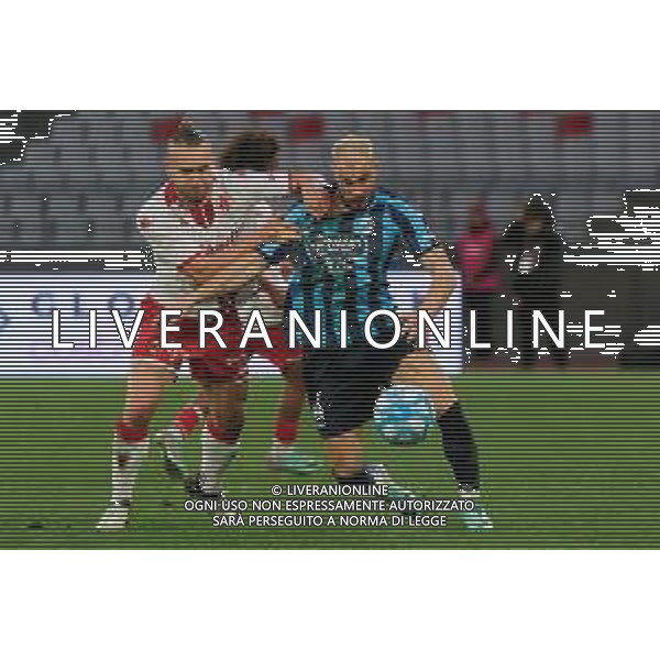 Davide Guglielmotti of Calcio Lecco 1912 and George Puscas of SSC Bari during the Italian Serie B match SSC Bari vs Calcio Lecco 1912 on February 10, 2024 at the San Nicola stadium in Bari, Italy. Photo by Emmanuele Mastrodonato/ag. Aldo Liverani sas/AGENZIA ALDO LIVERANI SAS