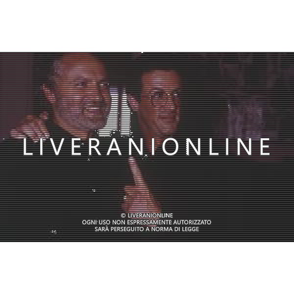 DIAP-RETROSPETTIVA SILVESTER STALLONE ATTORE NELLA FOTO SILVESTER STALLONE A MILANO NELL\'ANNO 1989 CON GIANNI VERSACE AG ALDO LIVERANI SAS