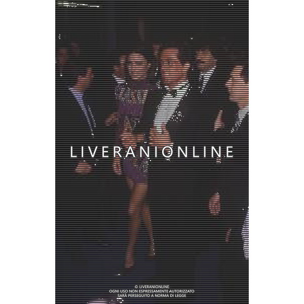 DIAP-RETROSPETTIVA SILVESTER STALLONE ATTORE NELLA FOTO SILVESTER STALLONE CON JENNIFER FLAVIN A CANNES NELL\'ANNO 1989 AG ALDO LIVERANI SAS 