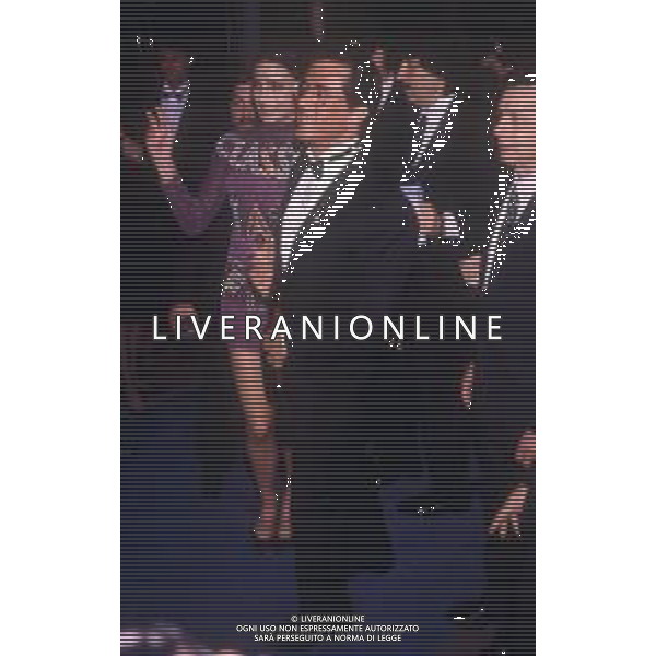 DIAP-RETROSPETTIVA SILVESTER STALLONE ATTORE NELLA FOTO SILVESTER STALLONE CON JENNIFER FLAVIN A CANNES NELL\'ANNO 1989 AG ALDO LIVERANI SAS 