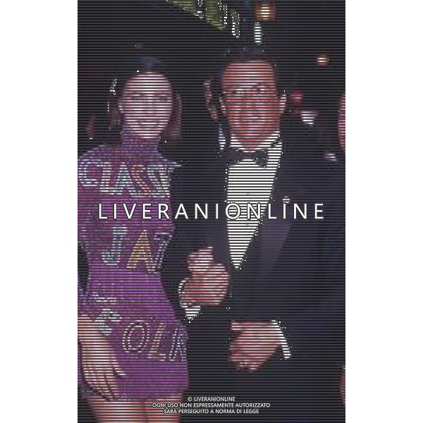 DIAP-RETROSPETTIVA SILVESTER STALLONE ATTORE NELLA FOTO SILVESTER STALLONE CON JENNIFER FLAVIN A CANNES NELL\'ANNO 1989 AG ALDO LIVERANI SAS 