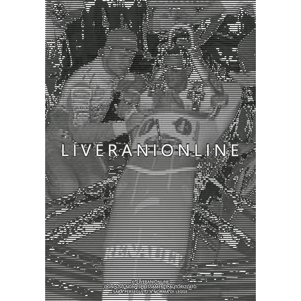 NEG-RETROSPETTIVA SILVESTER STALLONE ATTORE NELLA FOTO SILVESTER STALLONE A MONZA NELL\'ANNO 1994 CON DAVID COULTHARD AG ALDO LIVERANI SAS