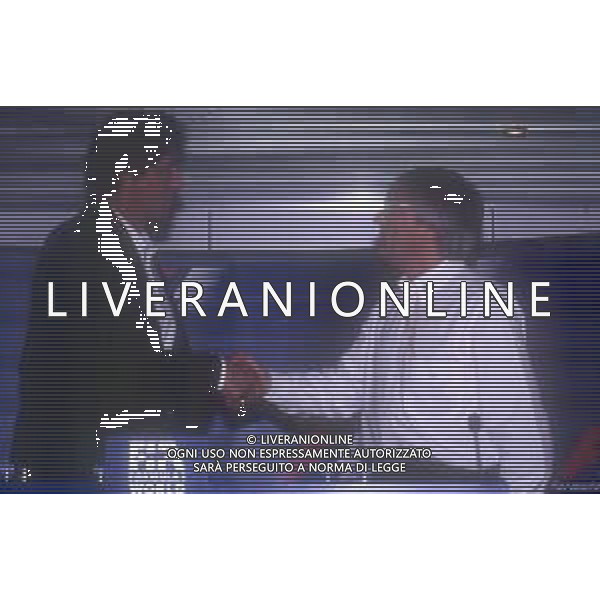 DIAP-RETROSPETTIVA SILVESTER STALLONE ATTORE NELLA FOTO SILVESTER STALLONE A MONZA NELL\' ANNO 1997 CON BERNIE ECCLESTONE AG ALDO LIVERANI SAS   
