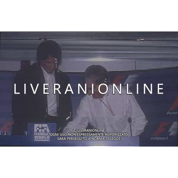 DIAP-RETROSPETTIVA SILVESTER STALLONE ATTORE NELLA FOTO SILVESTER STALLONE A MONZA NELL\' ANNO 1997 CON BERNIE ECCLESTONE AG ALDO LIVERANI SAS  