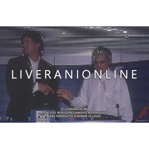 DIAP-RETROSPETTIVA SILVESTER STALLONE ATTORE NELLA FOTO SILVESTER STALLONE A MONZA NELL\' ANNO 1997 CON BERNIE ECCLESTONE AG ALDO LIVERANI SAS 