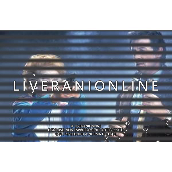 DIAP-RETROSPETTIVA SILVESTER STALLONE ATTORE NELLA FOTO SILVESTER STALLONE NEL FILM“Stop! Or My Mom Will Shoot “ NELL\'ANNO 1986 CON ESTELLE GETTY AG ALDO LIVERANI SAS 