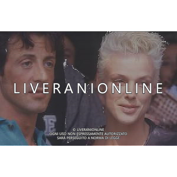 DIAP-RETROSPETTIVA SILVESTER STALLONE ATTORE NELLA FOTO SILVESTER STALLONE A MILANO ESCE DALL HOTEL PRINCIPE E SAVOIA CON BRIGITTE NIELSEN AG DIM STUDIO-AG ALDO LIVERANI SAS   