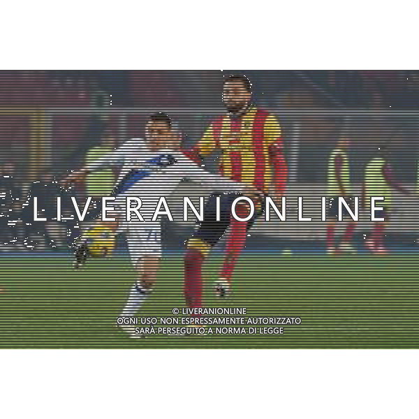TVEM Alexis Sanchez of FC Inter in action against Ahmed Touba of US Lecce during the Italian soccer Serie A match Lecce vs Inter on February 25, 2024 at Via del Mare Stadium in Lecce, Italy. Photo by Emmanuele Mastrodonato/agenzia Liverani