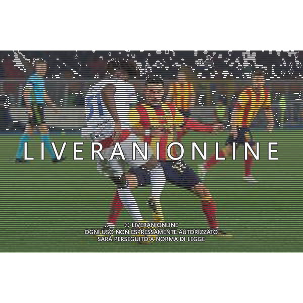 Yann Aurel Bisseck of FC Inter in action against Nicola Sansone of US Lecce