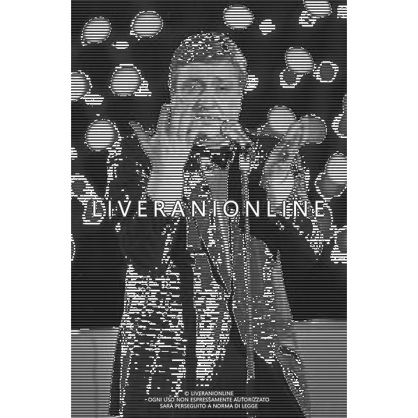 Neg- RETROSPETTIVA MARIO MEROLA CANTANTE NELLA FOTO OSPITE DELLA TRASMISSIONE TELEVISIVA \'R. CARRA\' SHOW\' NELL\'ANNO 1988 AG ALDO LIVERANI SAS