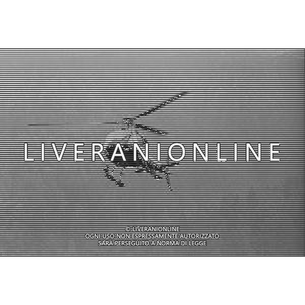 Neg- RETROSPETTIVA GIAN MAURO BORSANO PRESIDENTE TORINO CALCIO NELLA FOTO AL SUO ARRIVO CON L\'ELICOTTERO AL RITIRO ESTIVO DI BORNO NELL\'ANNO 1990-1991 AG ALDO LIVERANI SAS