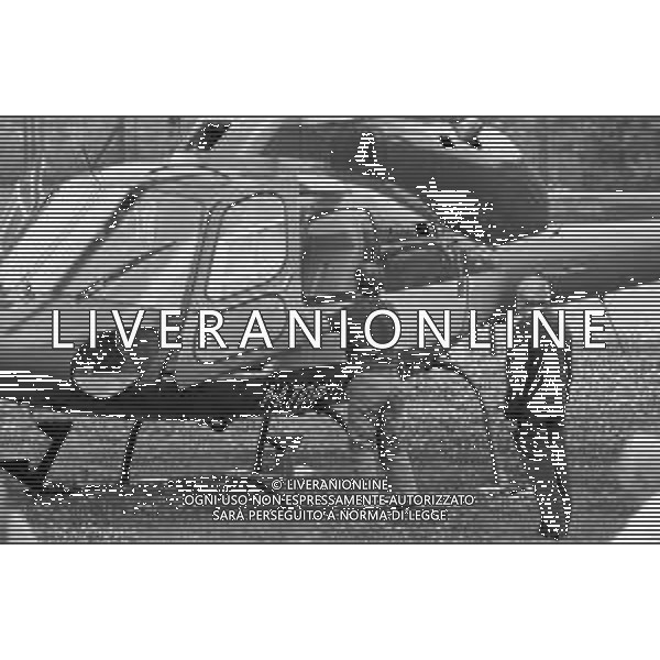 Neg- RETROSPETTIVA GIAN MAURO BORSANO PRESIDENTE TORINO CALCIO NELLA FOTO AL SUO ARRIVO CON L\'ELICOTTERO AL RITIRO ESTIVO DI BORNO NELL\'ANNO 1990-1991 AG ALDO LIVERANI SAS