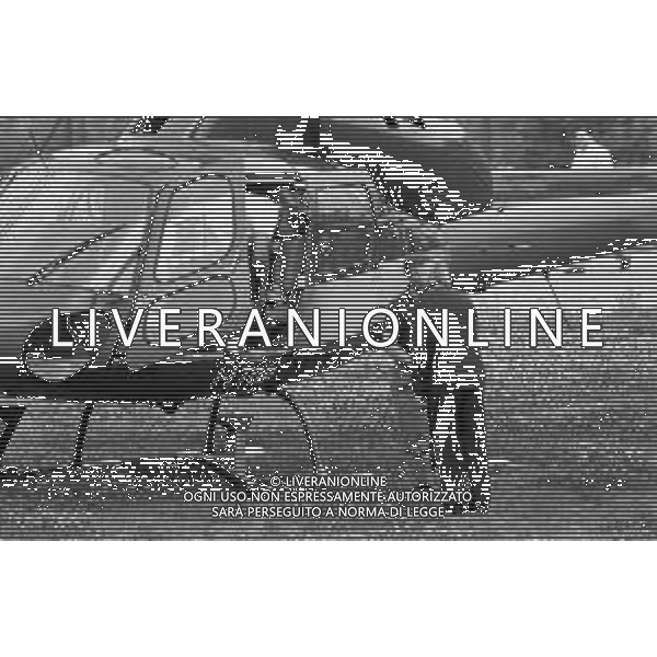 Neg- RETROSPETTIVA GIAN MAURO BORSANO PRESIDENTE TORINO CALCIO NELLA FOTO AL SUO ARRIVO CON L\'ELICOTTERO AL RITIRO ESTIVO DI BORNO NELL\'ANNO 1990-1991 AG ALDO LIVERANI SAS