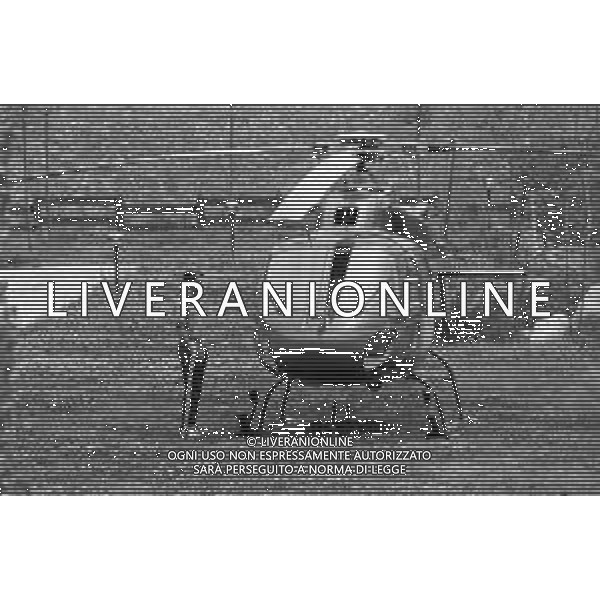 Neg- RETROSPETTIVA GIAN MAURO BORSANO PRESIDENTE TORINO CALCIO NELLA FOTO AL SUO ARRIVO CON L\'ELICOTTERO AL RITIRO ESTIVO DI BORNO NELL\'ANNO 1990-1991 AG ALDO LIVERANI SAS