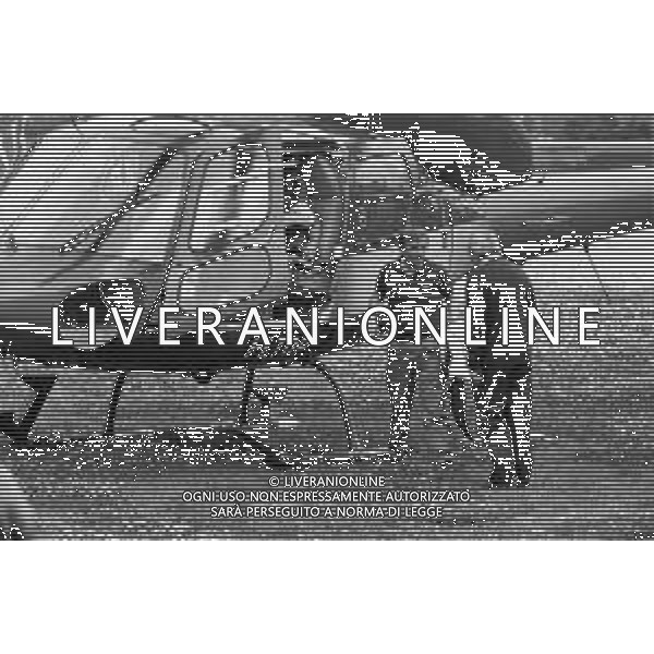 Neg- RETROSPETTIVA GIAN MAURO BORSANO PRESIDENTE TORINO CALCIO NELLA FOTO AL SUO ARRIVO CON L\'ELICOTTERO AL RITIRO ESTIVO DI BORNO NELL\'ANNO 1990-1991 AG ALDO LIVERANI SAS