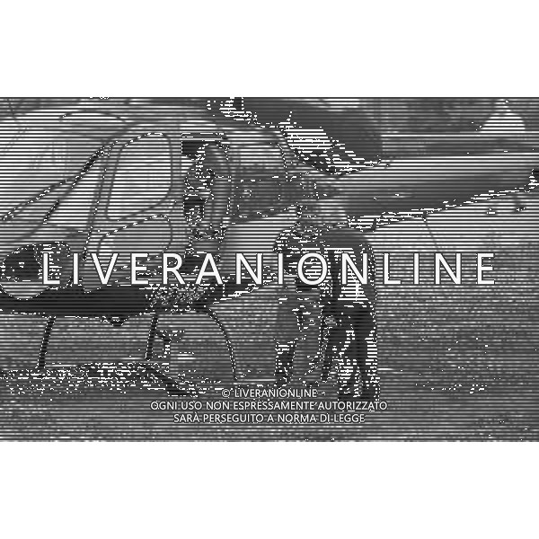 Neg- RETROSPETTIVA GIAN MAURO BORSANO PRESIDENTE TORINO CALCIO NELLA FOTO AL SUO ARRIVO CON L\'ELICOTTERO AL RITIRO ESTIVO DI BORNO NELL\'ANNO 1990-1991 AG ALDO LIVERANI SAS