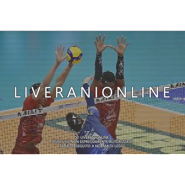 TVRG Monza vs Civitanova nella foto Stephen Maar (Vero Volley Monza) contro il muro di Barthelemy Chinenyeze (Civitanova) e Marlon Yant Herrera (Civitanova) Monza 24-03-2024 OpiquadArena Mint Vero Volley Monza vs Cucine Lube Civitanova SuperLega Credem Banca - gara 4 quarti di finale playoff scudetto foto Roberto Garavaglia/Agenzia Aldo Liverani sas/ AGENZIA ALDO LIVERANI SAS