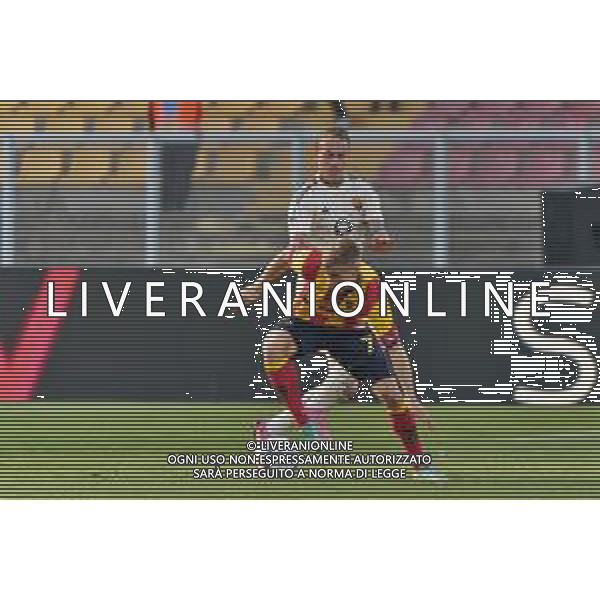 TVEM Pontus Almqvist of US Lecce and Rick Karsdorp of AS Roma during the Italian soccer Serie A match US Lecce vs AS Roma on April 1, 2024 at Via del Mare Stadium in Lecce, Italy. Photo Emmanuele Mastrodonato/agenzia Liverani