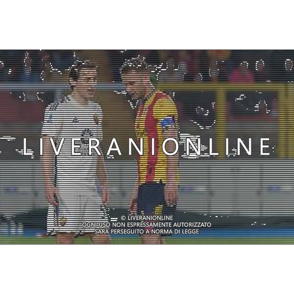 TVEM Edoardo Bove of AS Roma and Alexis Blin of US Lecce during the Italian soccer Serie A match US Lecce vs AS Roma on April 1, 2024 at Via del Mare Stadium in Lecce, Italy. Photo Emmanuele Mastrodonato/agenzia Liverani